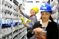 Warehouse-worker-and-Iinspector,-controller,-checking-inventory-64827831-1200pxW_adc1e075-1