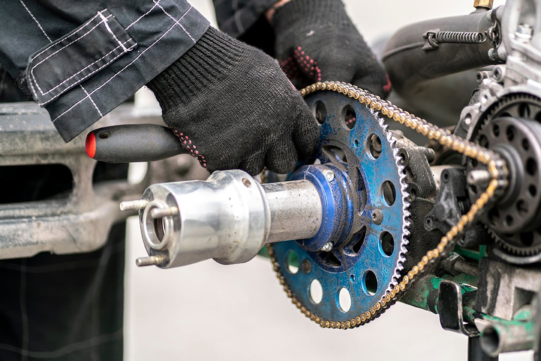a-mechanic-repair-the-karting-engine-in-workshop-2022-06-10-03-55-00-utc
