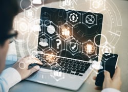 businessman-using-laptop-and-smartphone-placed-on-2025-10-15-01-18-16-utc