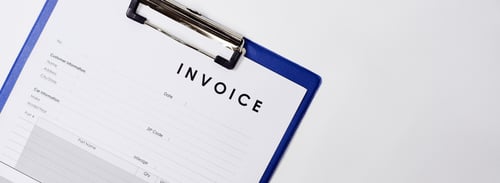 closeup-shot-of-an-invoice-document-on-a-white-sur-2023-11-27-05-26-19-utc