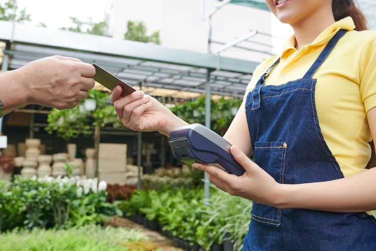 plant-nursery-worker-accepting-payment-2025-02-11-13-58-38-utc-1