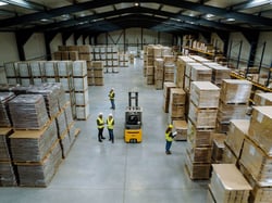 top-view-of-warehouse-workers-in-warehouse-team-o-2024-10-18-16-13-10-utc