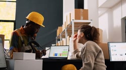 woman-discussing-order-shipping-details-2023-11-27-05-28-37-utc
